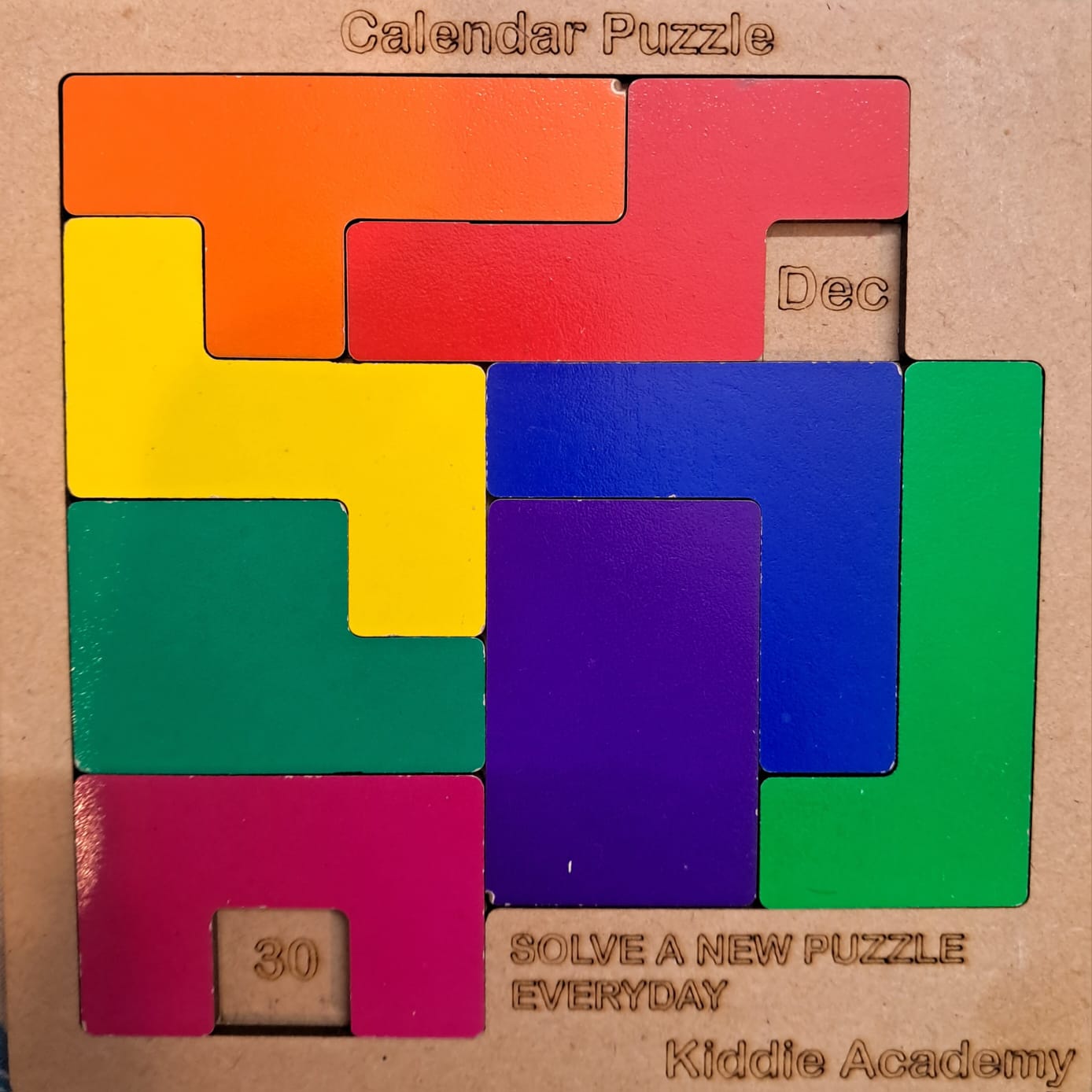 A calendar puzzle where the pieces must cover every square except today's month and date
